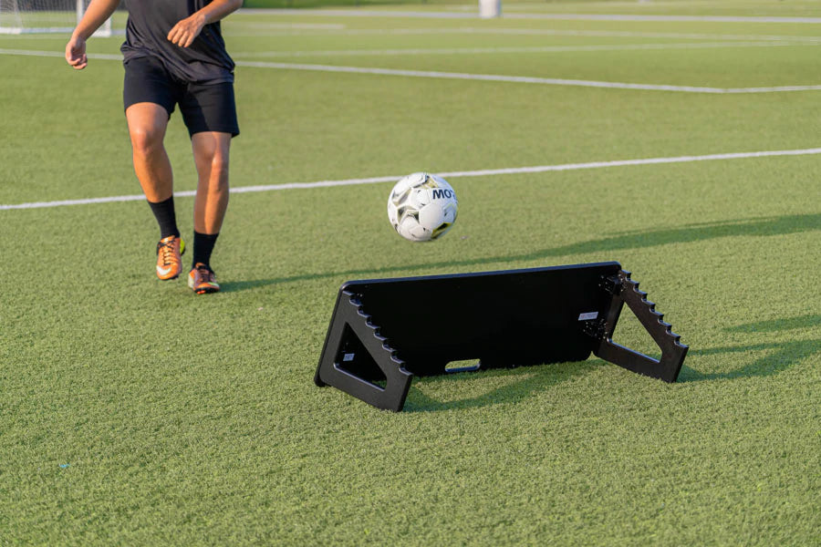 Soccer rebounder board